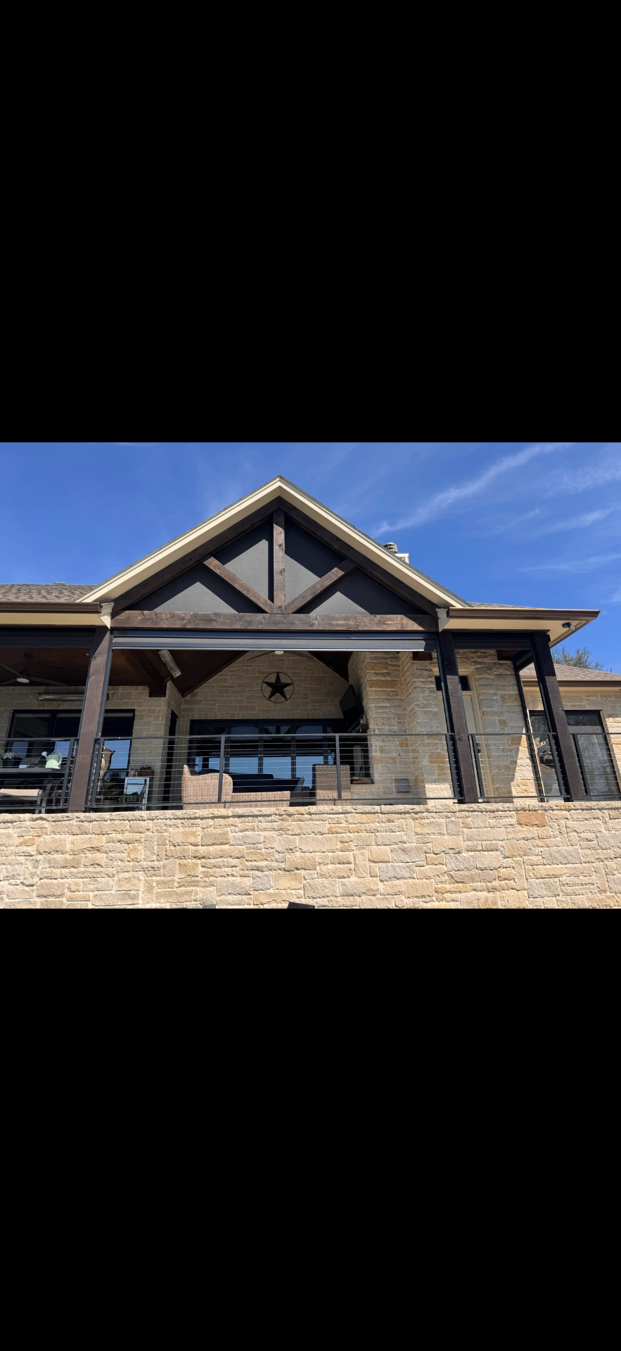 Texas timber porch & stone facade
