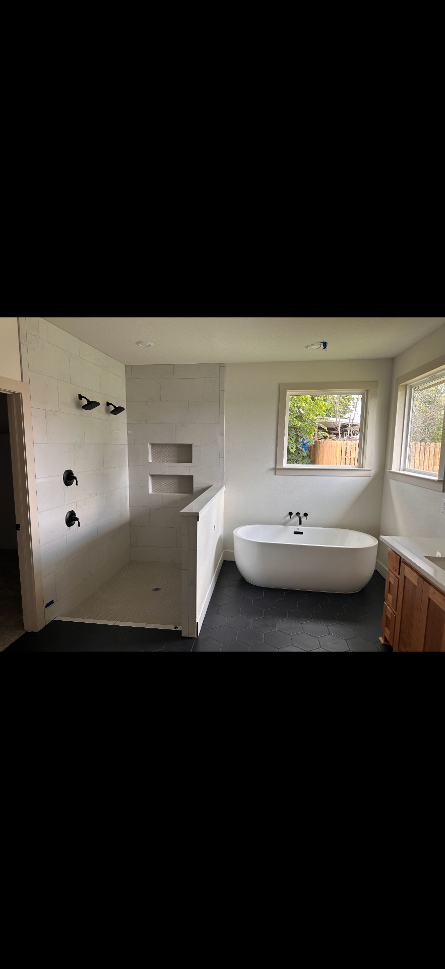 Master bath with soaking tub and walk-in shower
